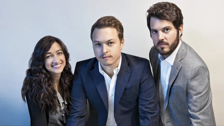 Loreanne Garcia (left) and Carlos Julio Garcia (center), co-founders of Kavak