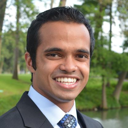 Headshot of Aditya Kaddu with trees in the background
