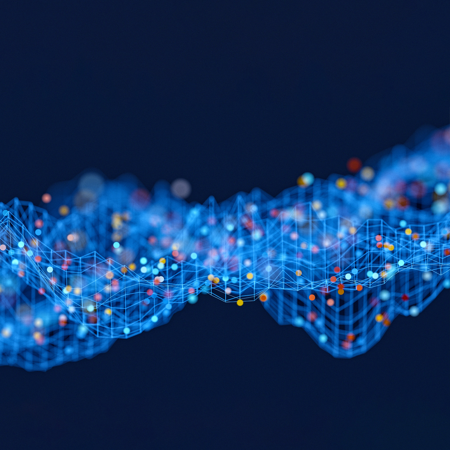 An abstract rendering of a data wave, with interconnected blue lines forming a grid-like structure. Spheres in shades of red, yellow, and blue, representing data points within raw data sets, are distributed across this grid, set against a solid dark blue background.