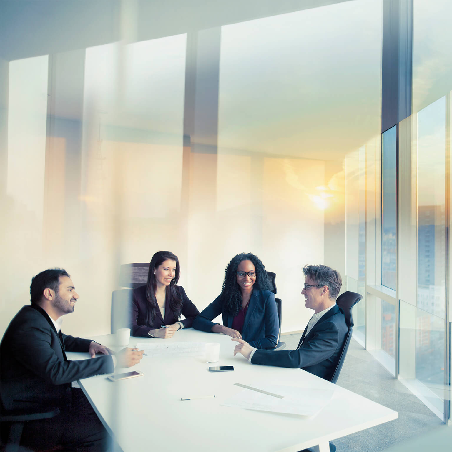 Business colleagues talking in meeting room