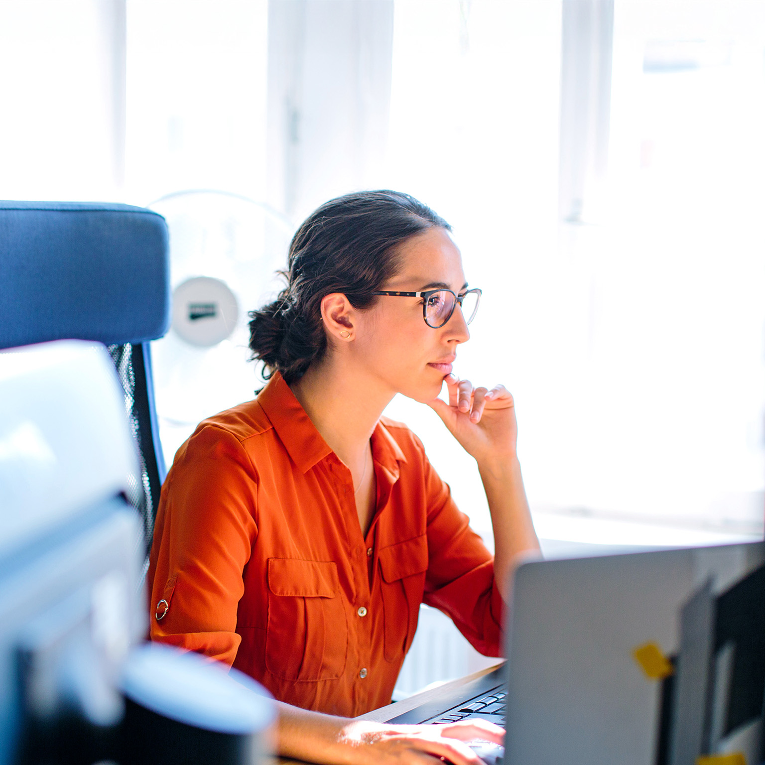 Business woman working at her desk