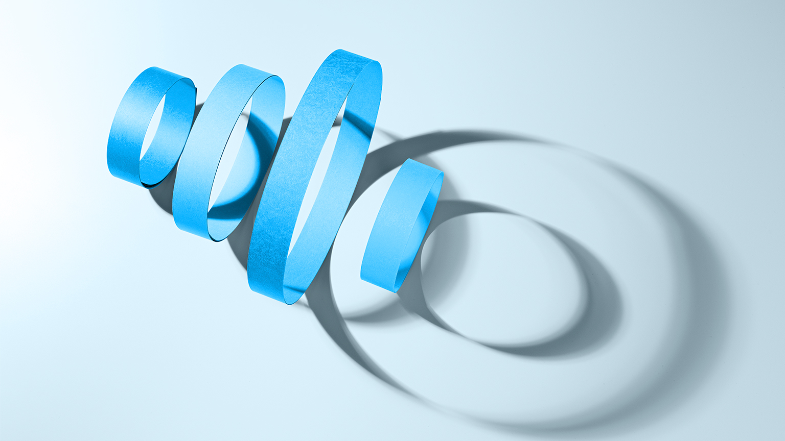 graphic image of cut-out circles with shadow