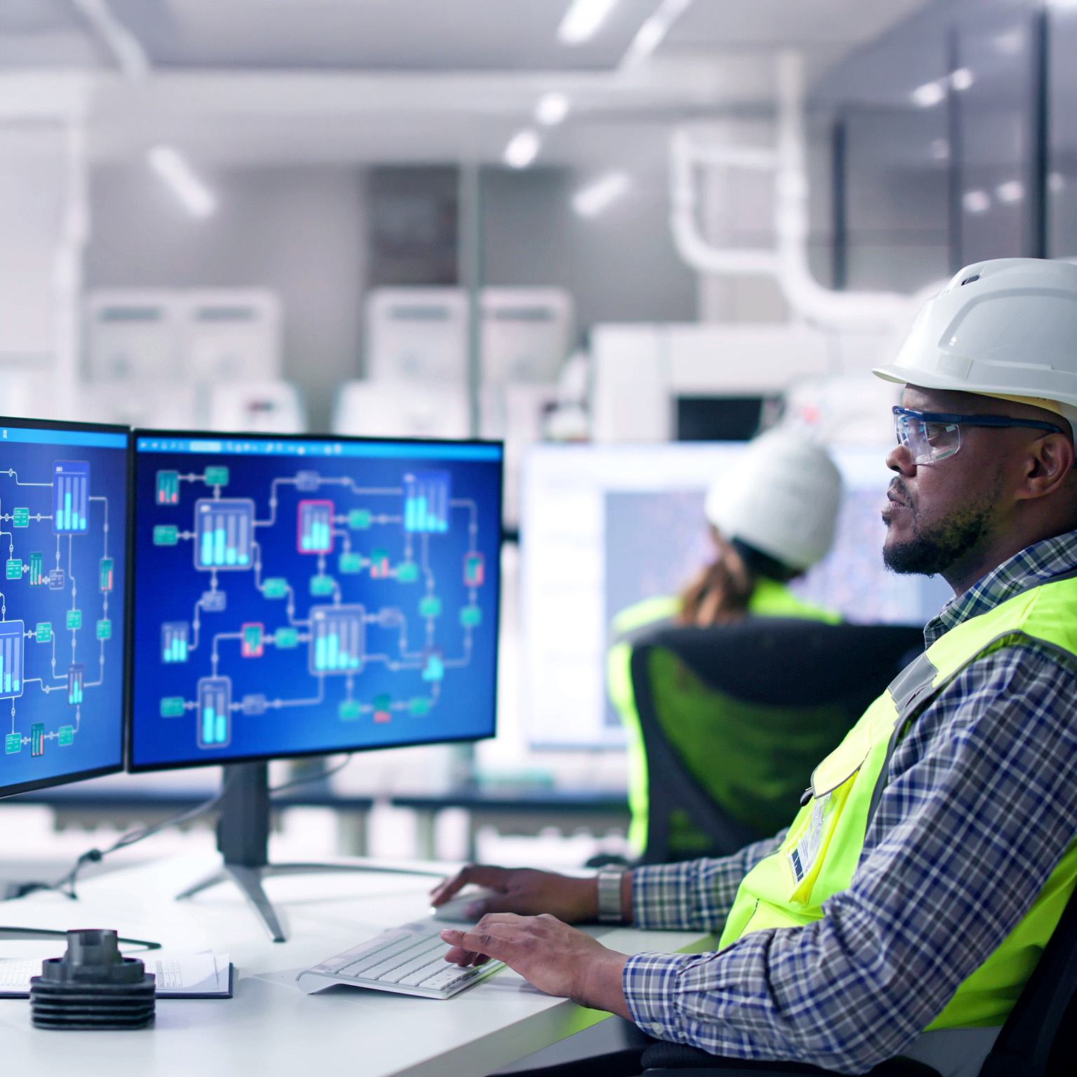 An engineer operators using scada system at industrial plant