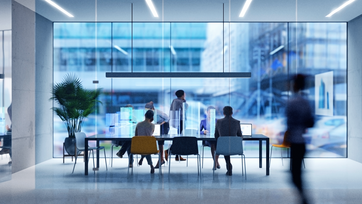 Photo of people sitting at a conference table