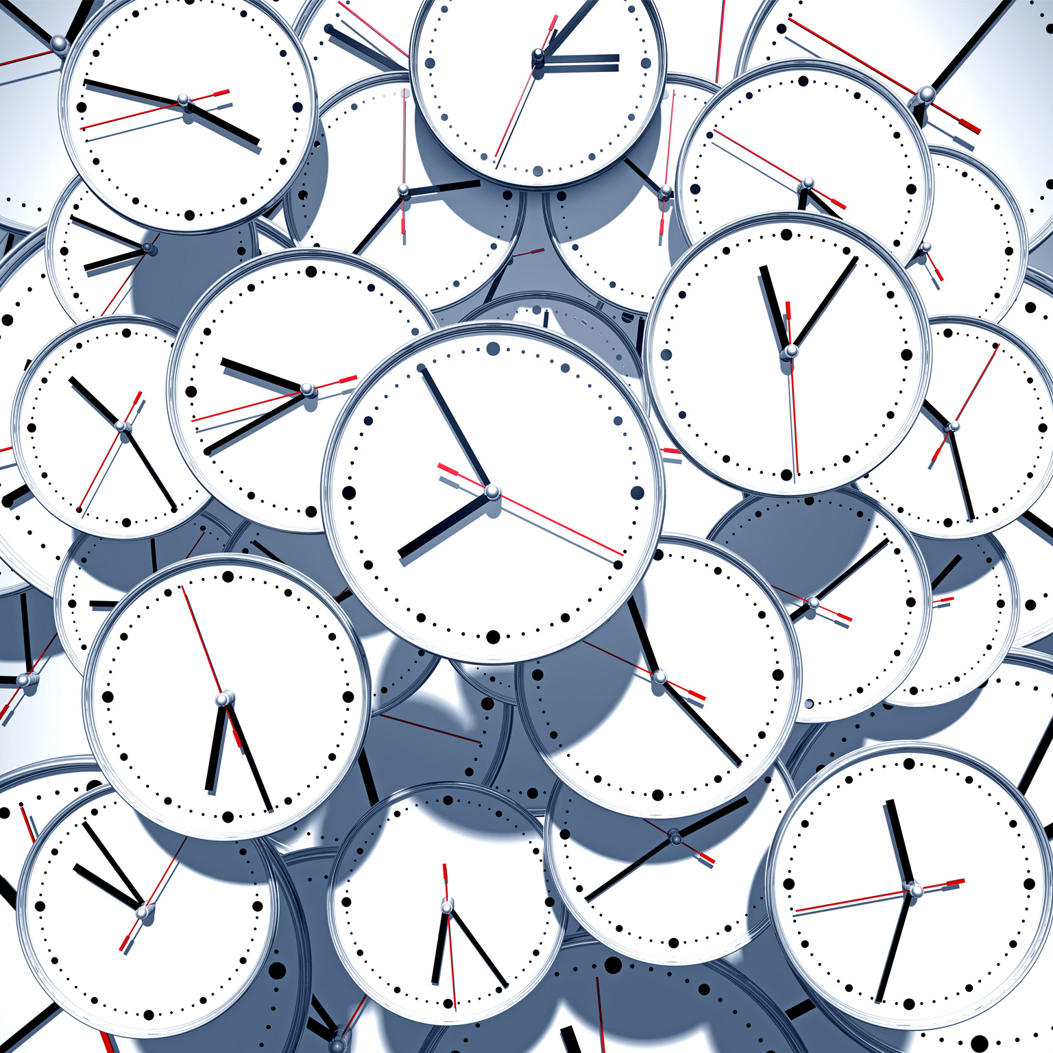 A jumbled pile of clock faces