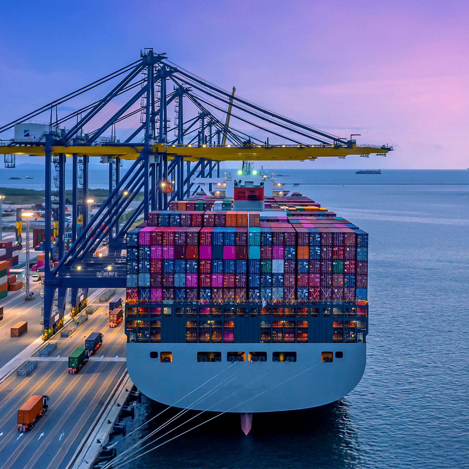 Container ship in seaport at night