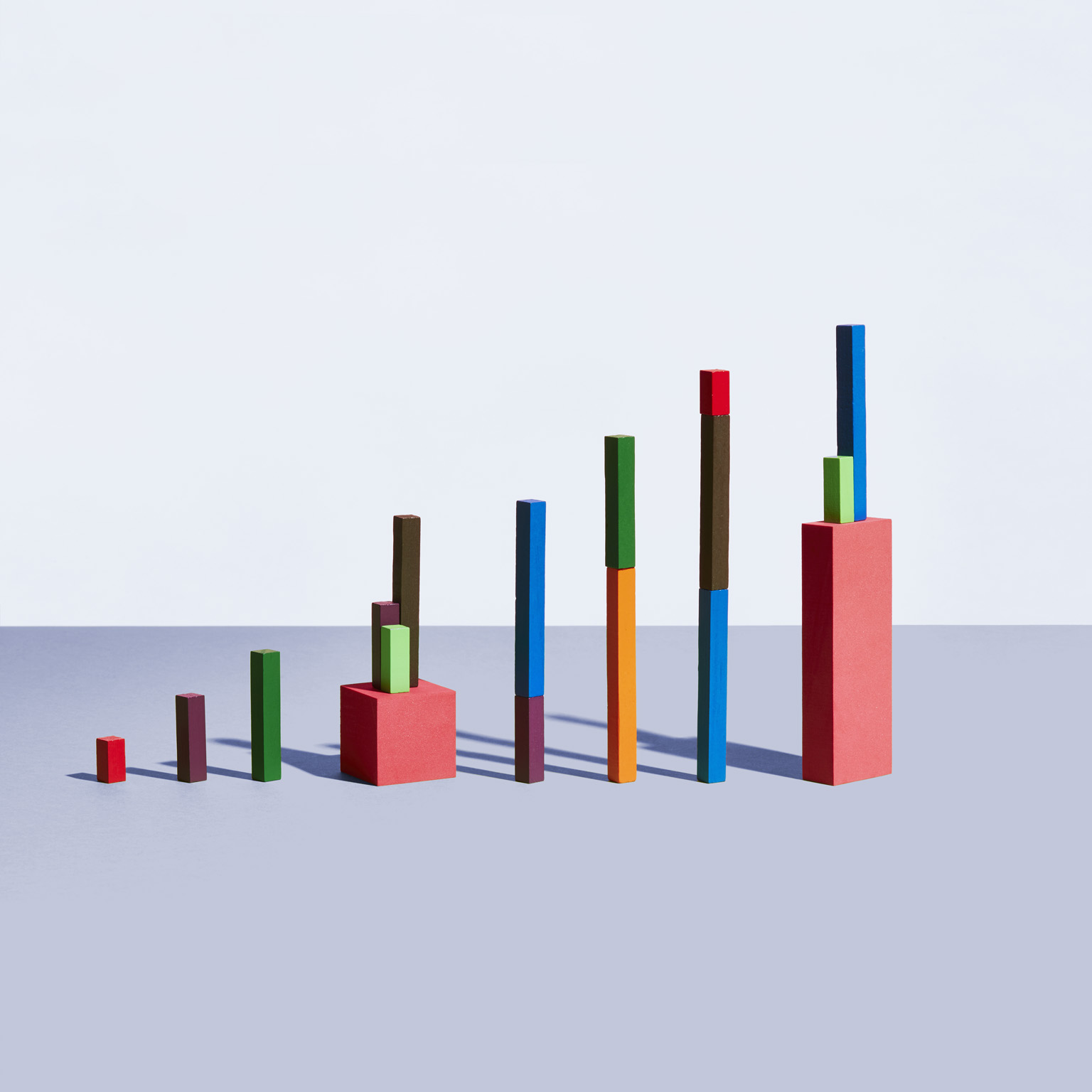 Conceptual image of colorful geometric blocks arranged as a graph.