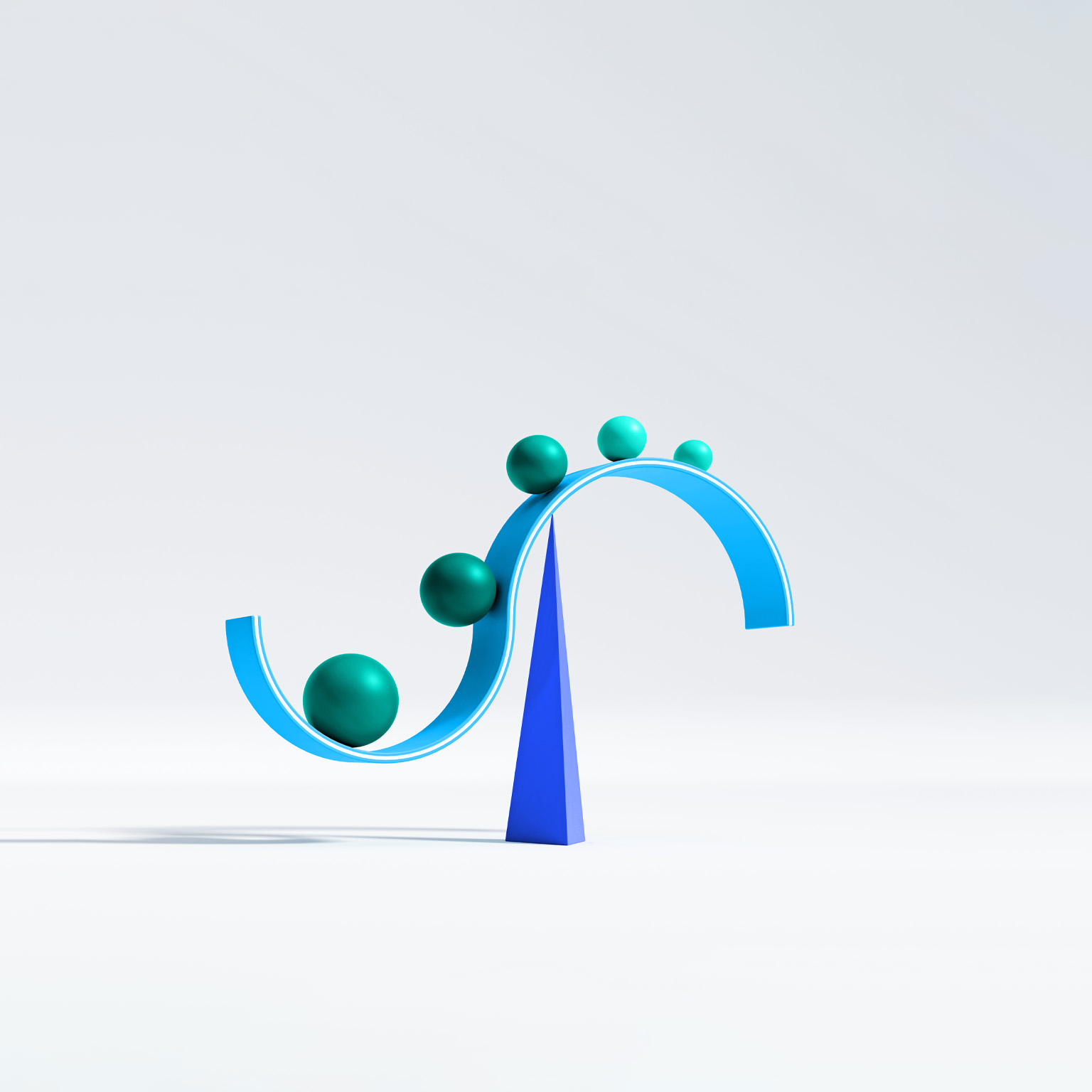 A curved, cyan structure resembling a sideways S is balanced atop a dark blue pyramid. Along the curve of the structure, there are several spheres of varying sizes, starting from the largest and descending in size as they move to a higher point on the curve. 