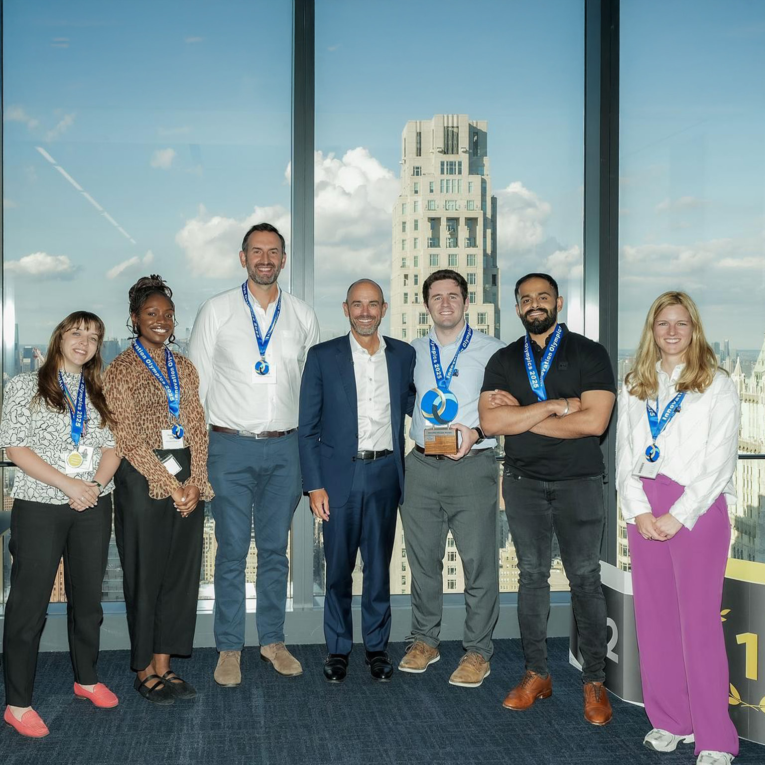 Innovation Olympics winning team, with Iris Roelens, John Law-Lund, and Suryansh Soni