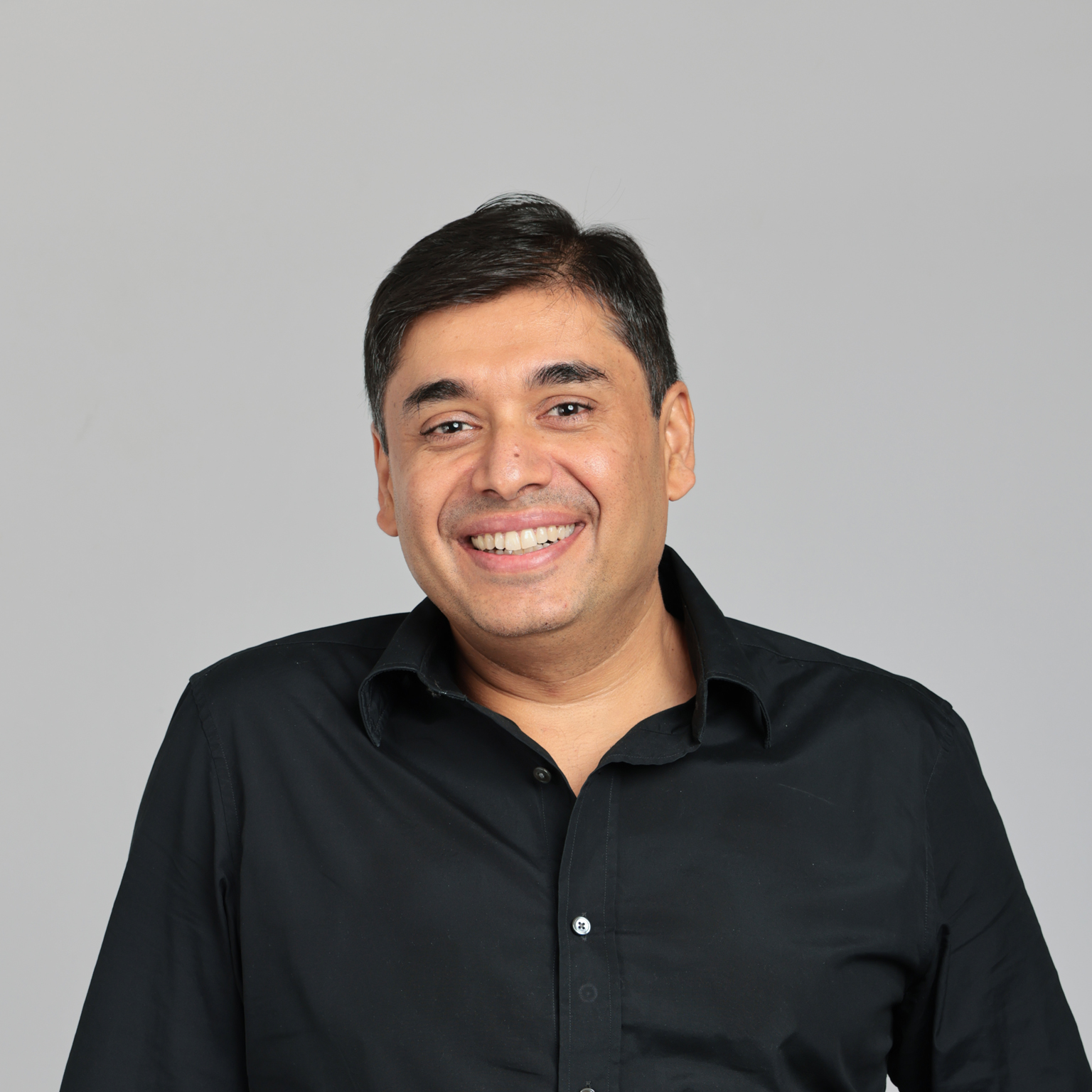 Smiling portrait of Naveen Tewari