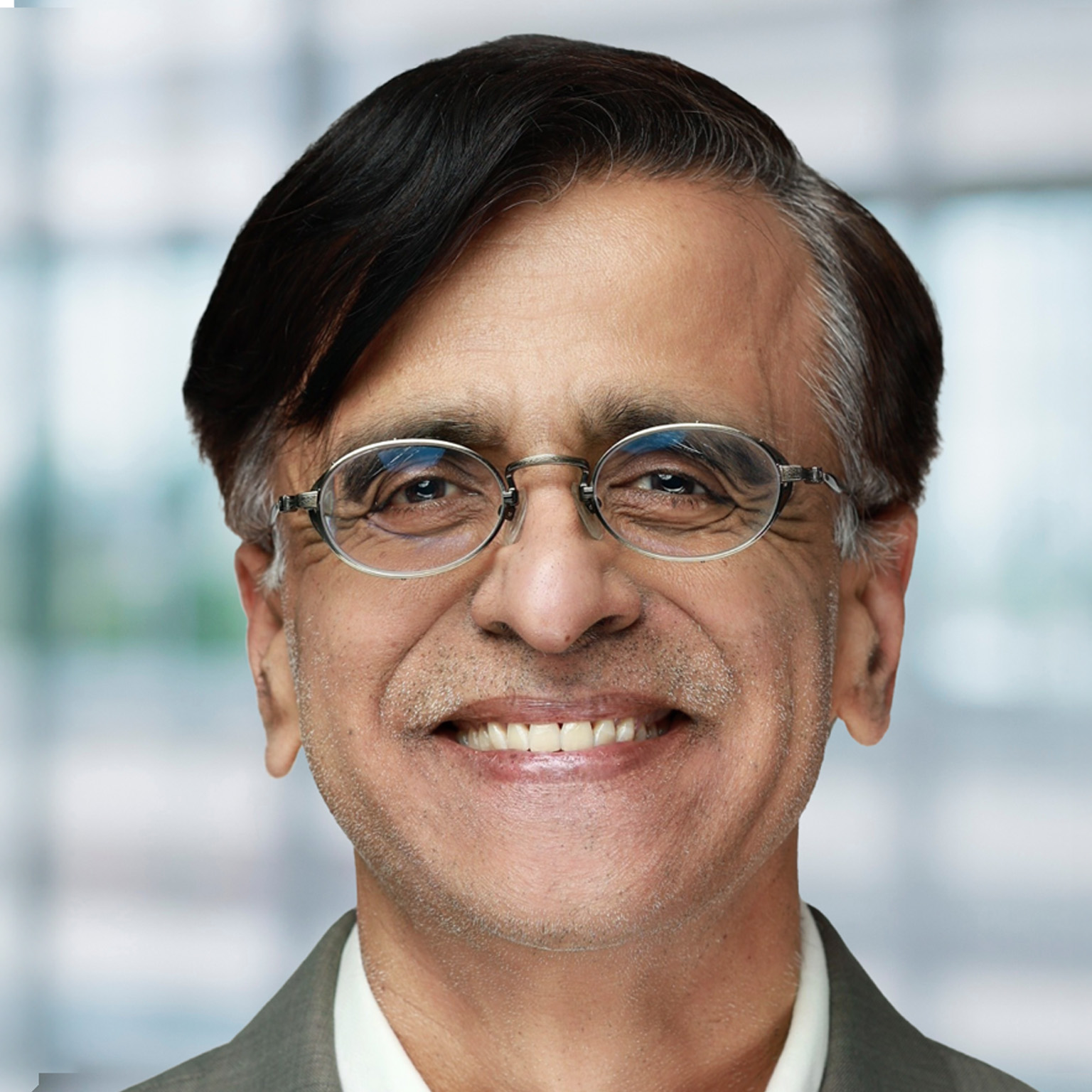 Smiling portrait of Snowflake CEO Sridhar Ramaswamy 