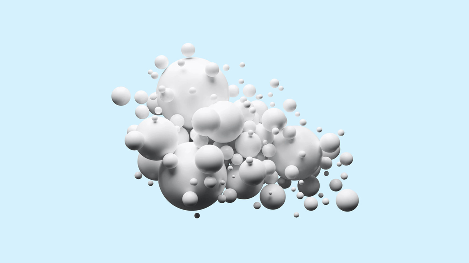Group of white spheres on light blue background