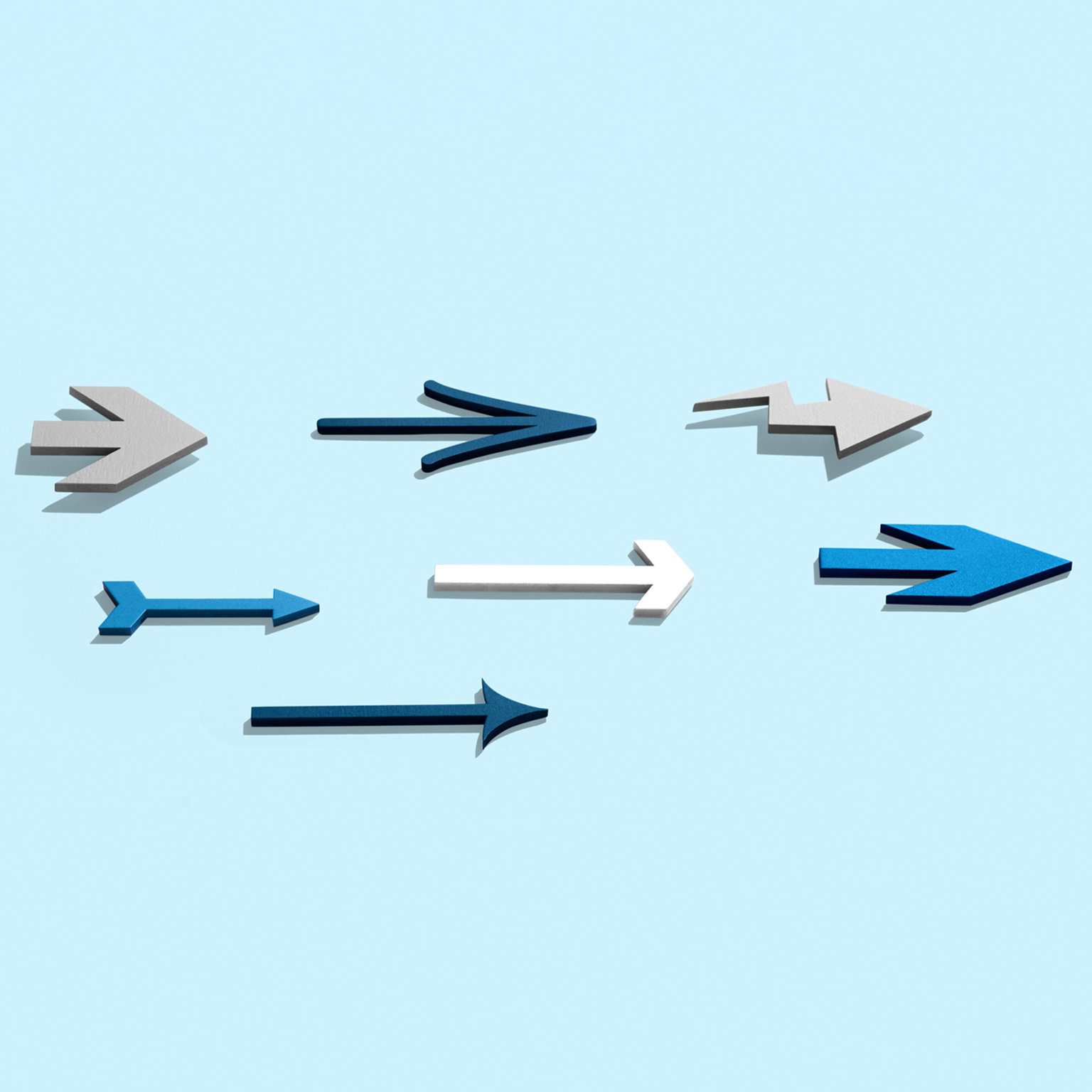 A group of different arrows moving forwards together