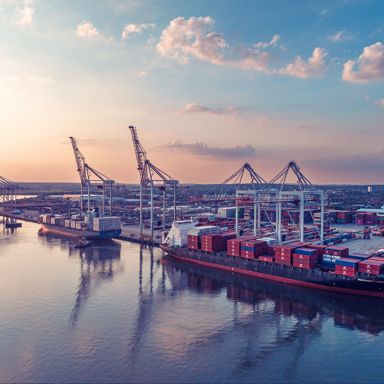 An aerial view of container ships in dock