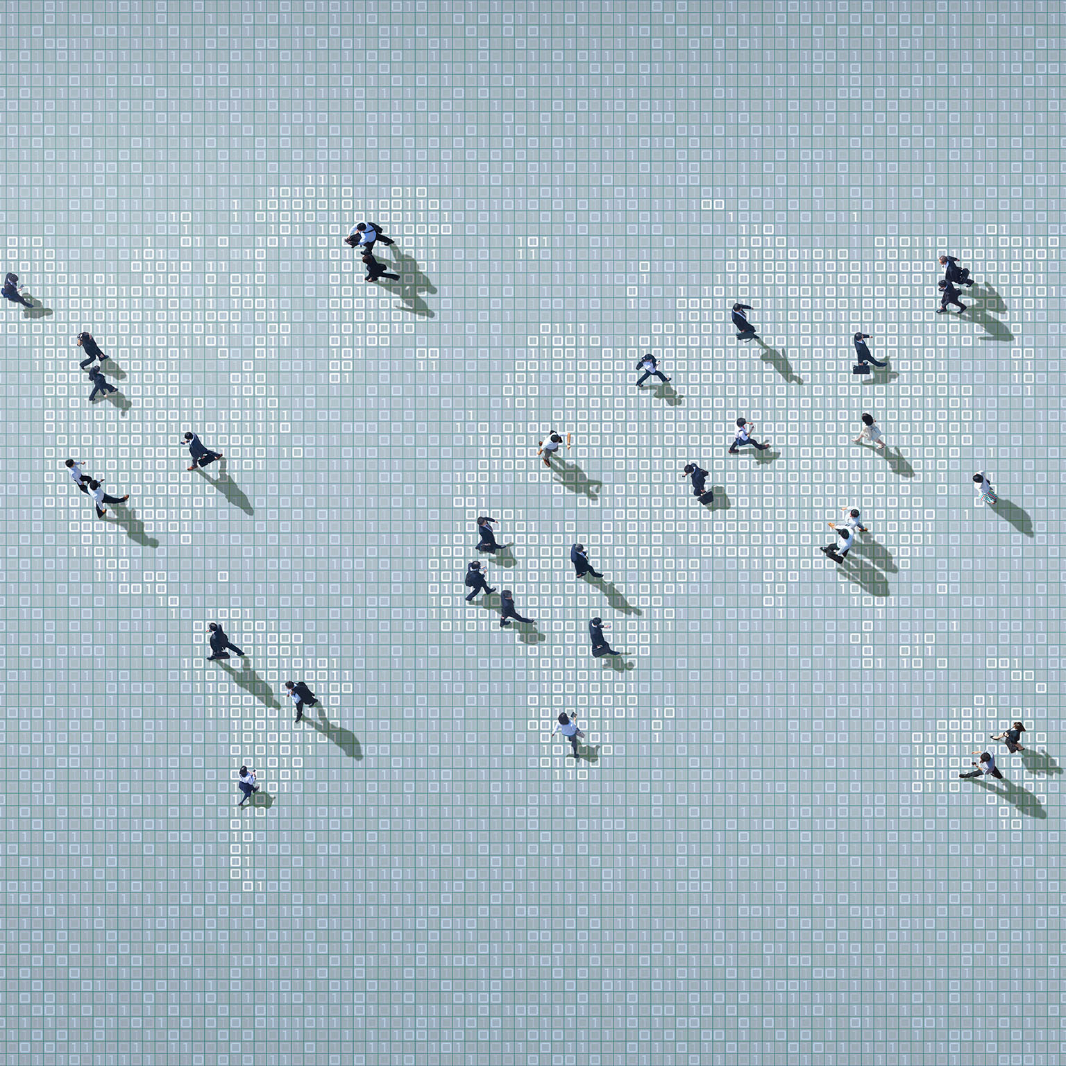 Businessmen walking on binary code world map