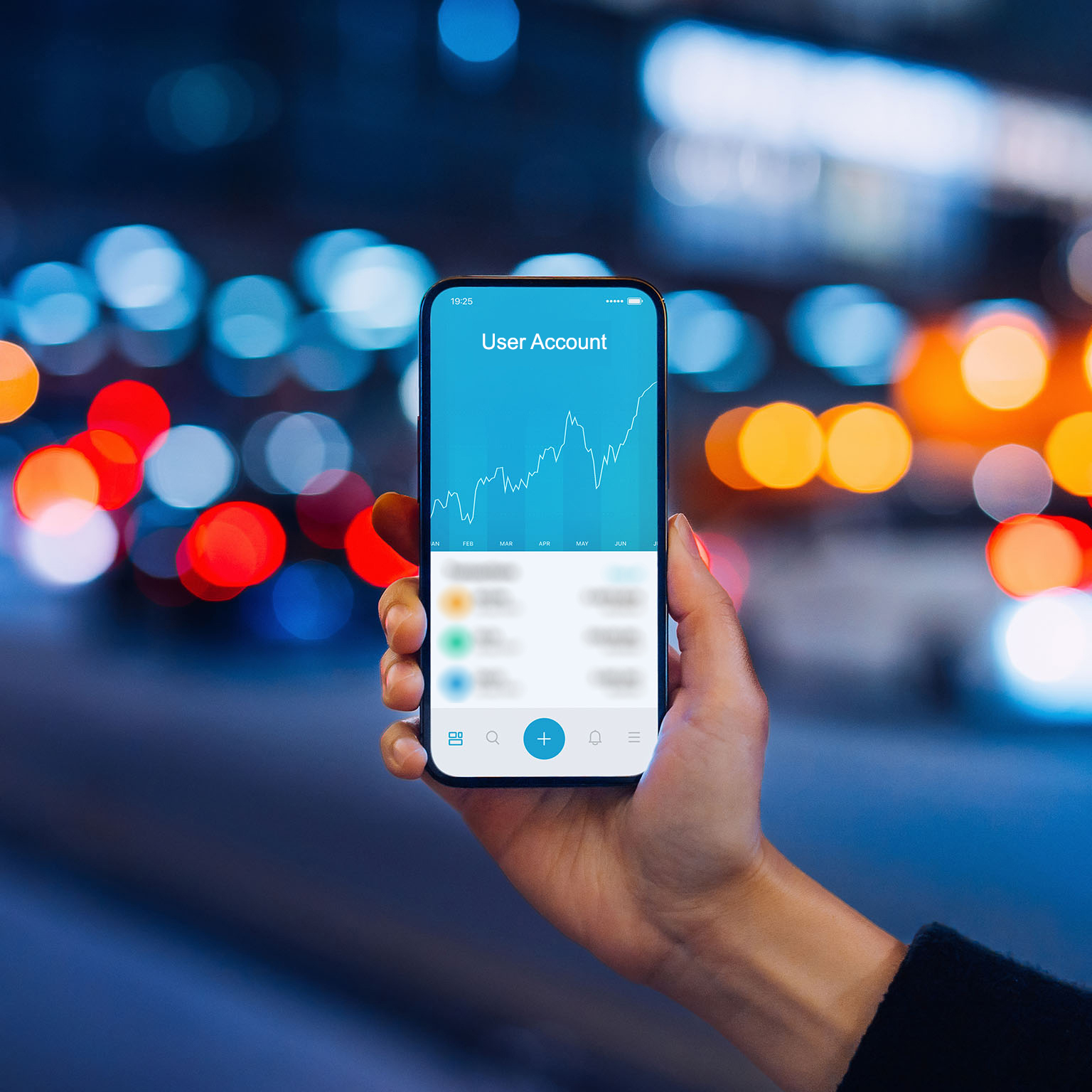 Woman's hand holding up smartphone against illuminated city street lights, using NFT investment wallet on smartphone in city, working with blockchain technologies.