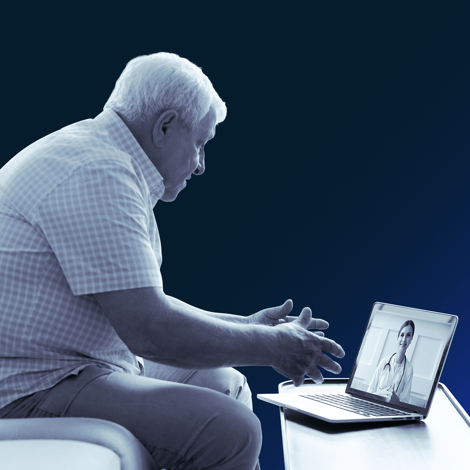 Senior man using laptop.