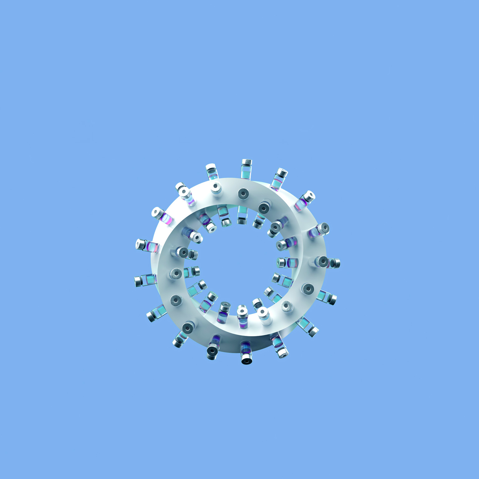 A twisting ring with vaccine vials affixed to its perimeter.
