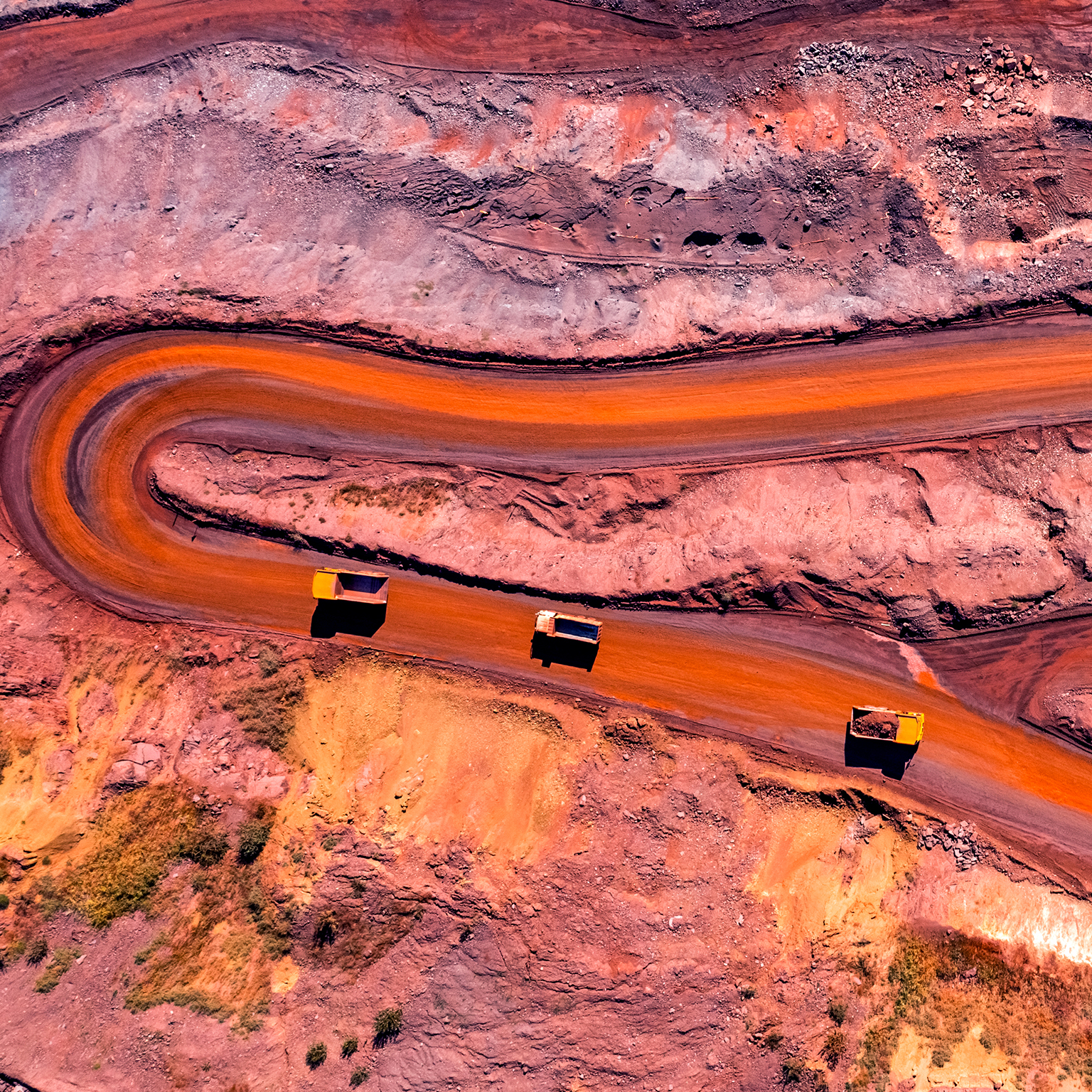 Aerial view of winding roads surrounding copper mine.