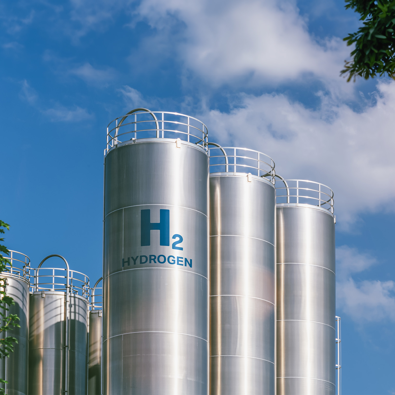 Hydrogen renewable energy production - hydrogen gas for clean electricity solar and windturbine facility - stock photo