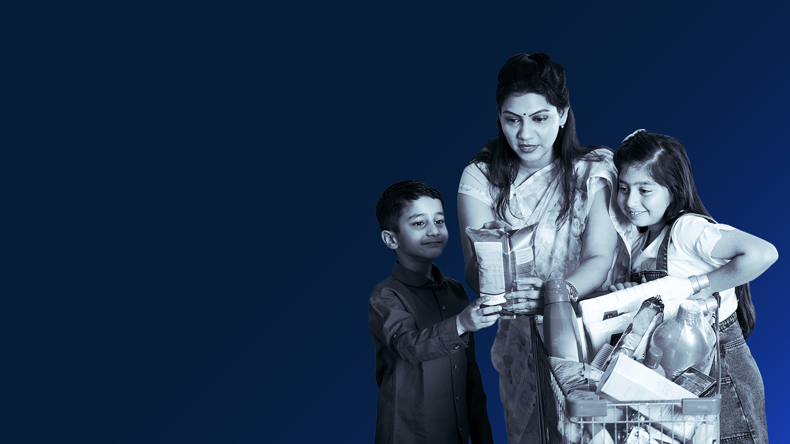 Indian mother and children with a cart full of groceries