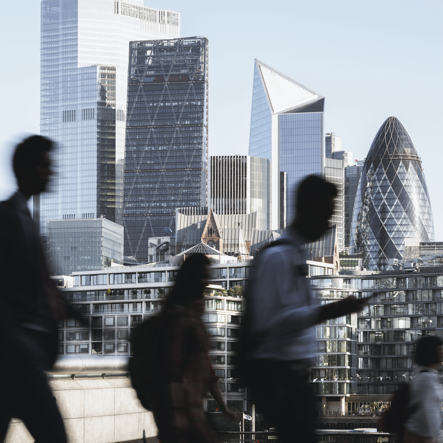 London city workers against high rise office buildings