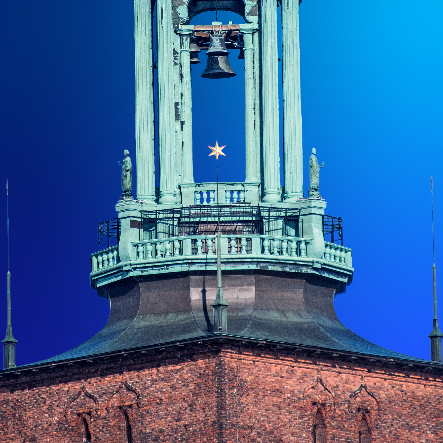 Stockholm City Hall on the eastern tip of Kungsholmen island, facing the islands of Riddarholmen and Södermalm, in Stockholm, Sweden. Its 106-metre tower is topped with the Three Crowns, the Swedish national symbol.