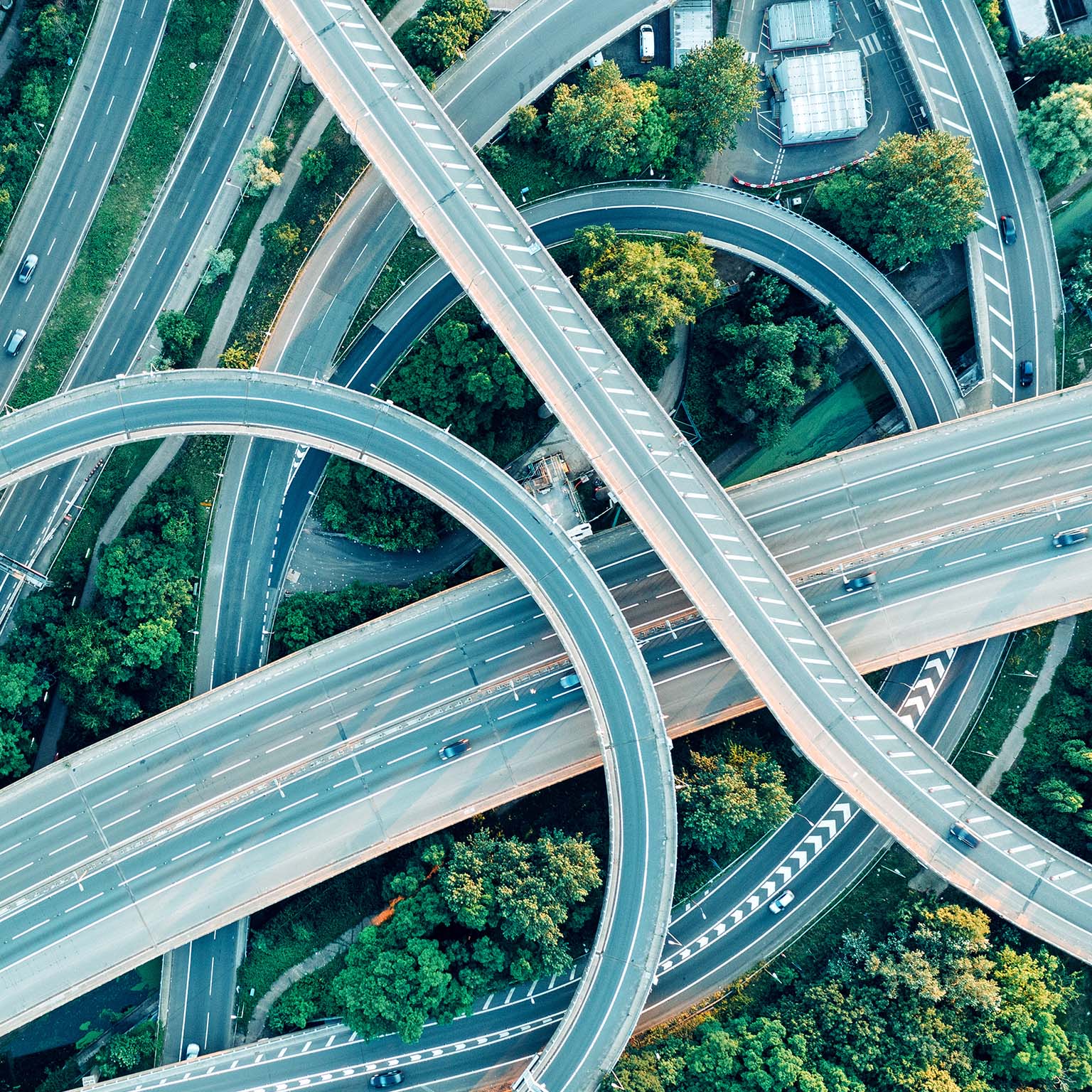 An aerial daytime view of a UK motorway intersection