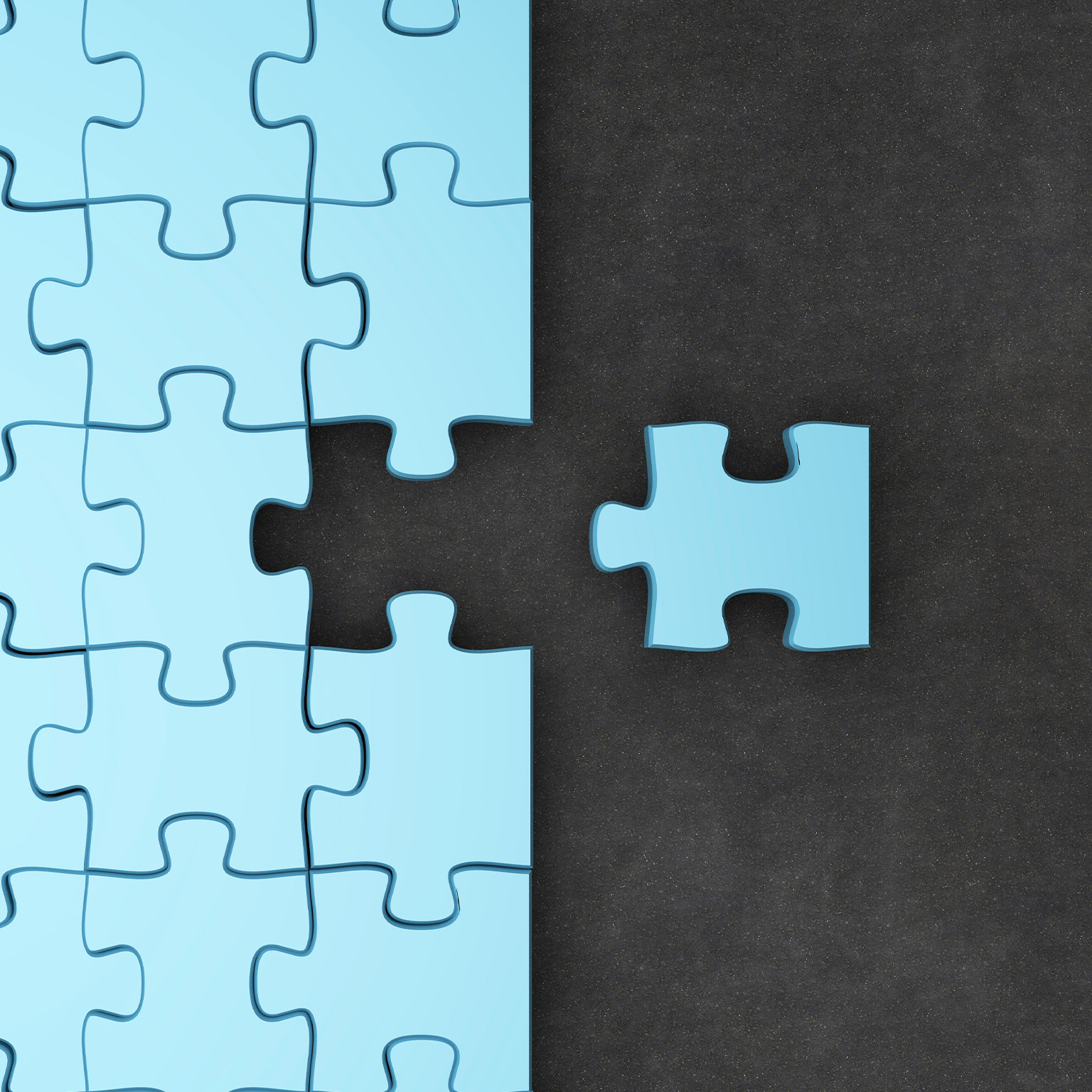 Jigsaw puzzle pieces. One fitting piece sitting outside of nearly completed puzzle.