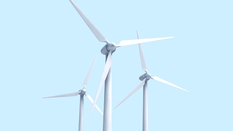 3 wind turbines against a light blue sky. 