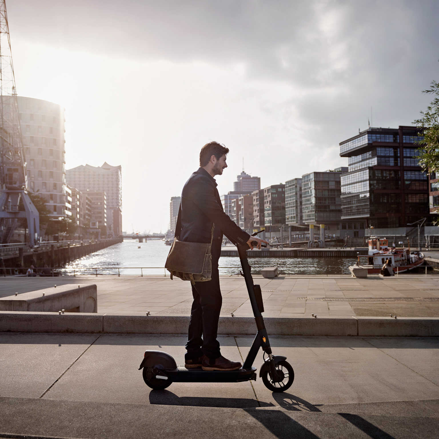 Young man on e-scooter in the city
