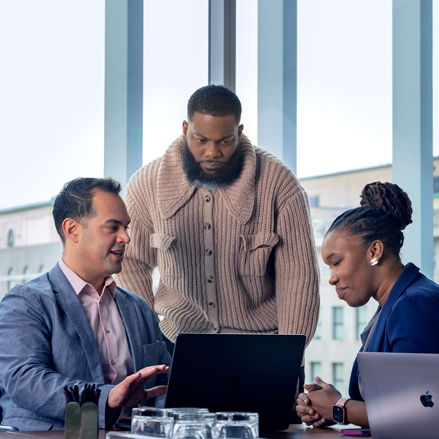 Professionals collaborating on skills-based hiring strategy